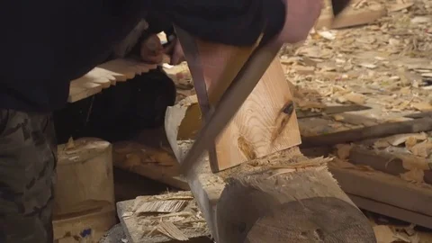 The work of a skilled carpenter with an axe Stock Footage 84039333