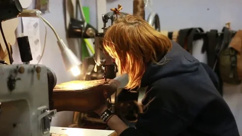 Work on skin, tailor, sewing, needle, purse Stock Footage 69088549