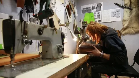 Work on skin, tailor, sewing, needle, purse Stock-Footage 69088589