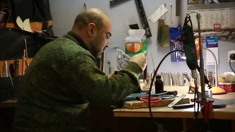 Work on skin, tailor, sewing, needle, purse Video stock 69088613