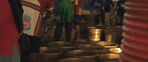 Work on sorting and selling fish on the pier. Stock Footage 232974369