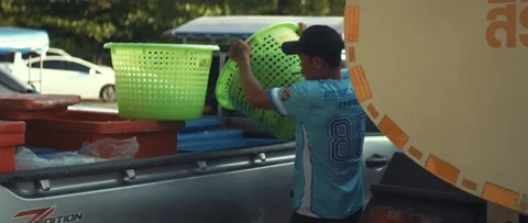 Work on sorting and selling fish on the pier. Stock Footage 232975426