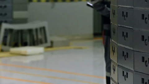 Work special device checks for the presence of the finished product. The worker Stock Footage 93272736