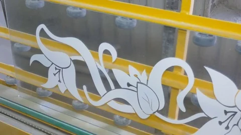 The work of a special machine that applies a pattern on the glass. Video stock 85058275