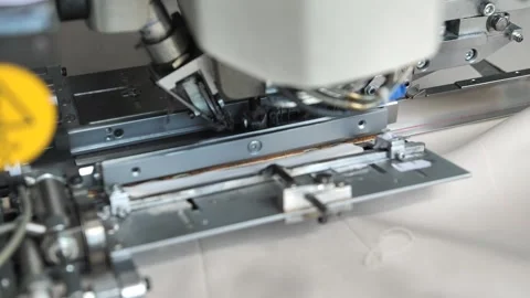 Work of a specialized sewing machine for sewing pockets on clothes Stock Footage 247827949