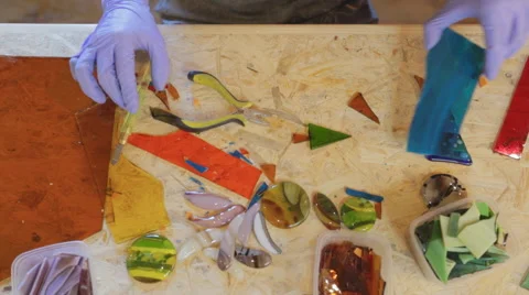 Work stained glass workflow wizard, place of the cut for further work with them Stock Footage 57739863