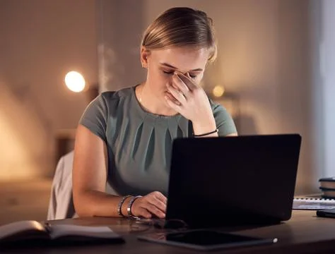 Work stress, headache and computer work at night in a office with project report Stock Photos