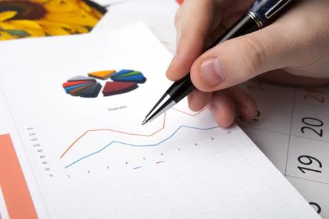 Work studying the chart in the office Stock Photos
