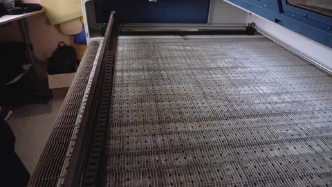 Work surface of fabric cutting machine in workshop Stock Footage 236907698