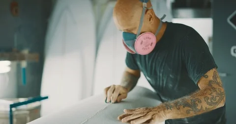 At work in the surfboard shaping bay Stock Footage 123044760