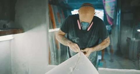 At work in the surfboard shaping bay Stock Footage 123045150