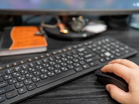 Work at the table at the computer Stock Photos