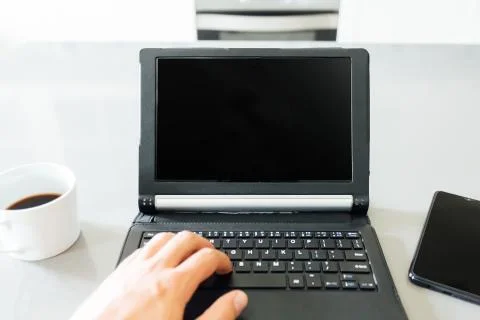 Work table at home with a tablet and a mobile phone 库存照片