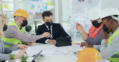 Work in terms covid-19 where good-looking professional experienced mixed races Stock Footage 145799744
