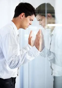 Work, thinking and a man at a window with stress, corporate burnout and tired Foto stock