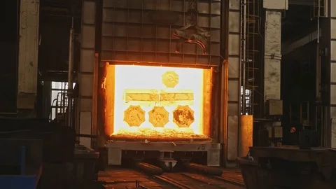 Work tick-borne crane at an engineering plant. The crane lifts the hot steel  Stock Footage 115508043