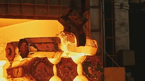 Work tick-borne crane at an engineering plant. The crane lifts the hot steel  스톡 동영상 115508067