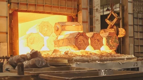 Work tick-borne crane at an engineering plant. The crane lifts the hot steel  Stock Footage 115508091