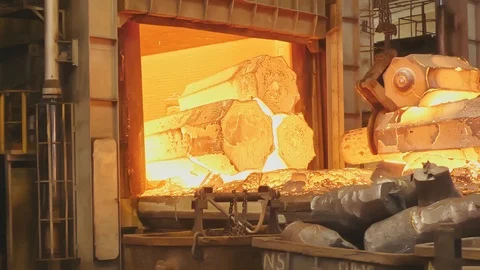 Work tick-borne crane at an engineering plant. The crane lifts the hot steel  스톡 동영상 115508111