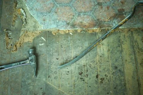 Work tools of a builder, a hammer and a crowbar. Stock Photos