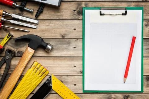 Work tools for carpenter and notepads. Carpentry. Stock Photos