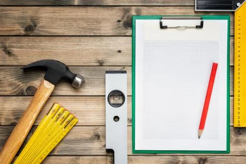 Work tools for carpenter and notepads. Carpentry. Stock Photos