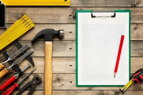Work tools for carpenter and notepads. Carpentry. Stock Photos