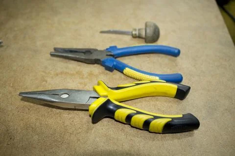 Work tools made of iron. Pliers, nippers , carpenter tools Stock Photos