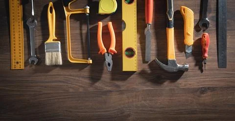 Work tools on the wooden background. Stock Photos