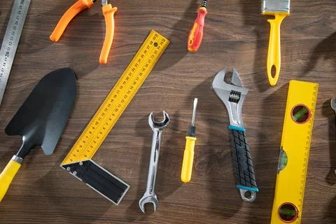 Work tools on the wooden background. Stock Photos