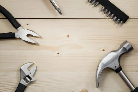 Work tools on a wooden table. Flat lay. Copy space Stock Photos