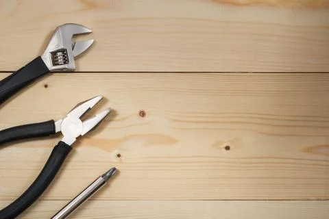 Work tools on a wooden table. Flat lay. Copy space. Color toning Stock-Fotos