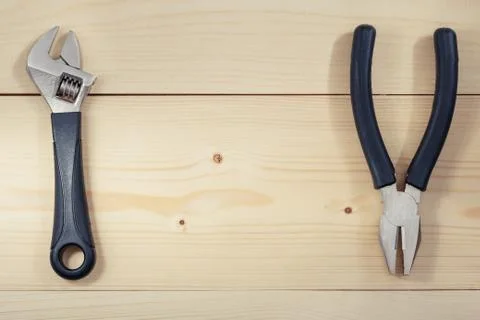 Work tools on a wooden table. Flat lay. Copy space. Color toning Stock Photos