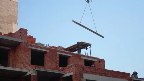 The work of a tower crane in the construction of an apartment building. Stock Footage 143117618
