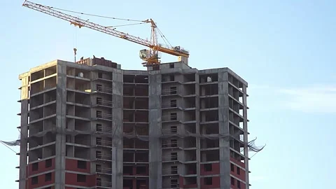 Work of a tower crane during the construction of a skyscraper Stock Footage 227506547