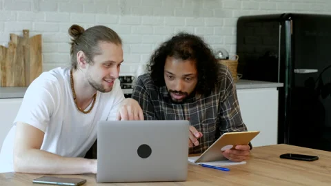 The Work Of Two Freelancers On A New Online Project, Working At Home Stock Footage 165665672
