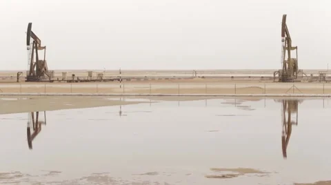 Work Of Two Oil Pump Jacks Stock Footage 63170788