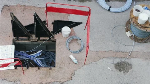 Work under way in a cockpit road for telephone network voice and data 스톡 동영상 147016215