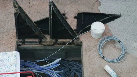 Work under way in a cockpit road for telephone network voice and data 스톡 동영상 147016226