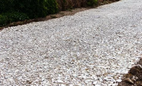 Work is underway to build and lay a new road. Gravel of large fractions Cru.. Stock Photos