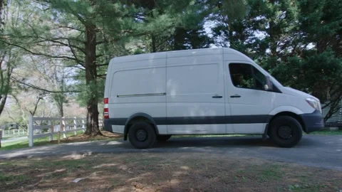 Work Vans in Driveway Stock Footage 197145013