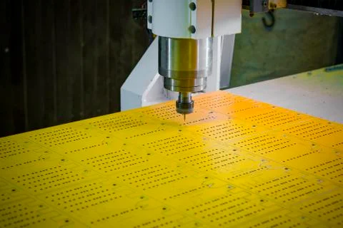 Work of the vertical milling machine with CNC. Milling spindle. Stock Photos