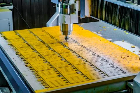 Work of the vertical milling machine with CNC. Milling spindle. Stock Photos