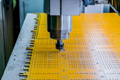 Work of the vertical milling machine with CNC. Milling spindle. Stock Photos