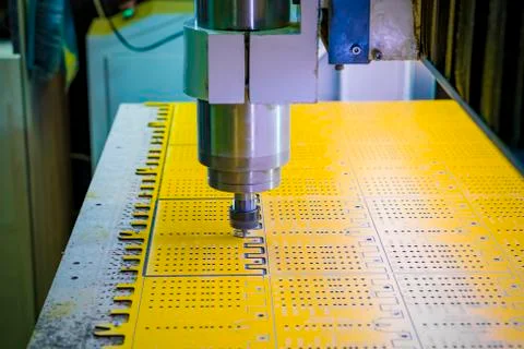 Work of the vertical milling machine with CNC. Milling spindle. Stock Photos