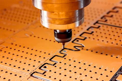 The work of a vertical milling machine. The spindle and the cutter are arranged Stock Photos