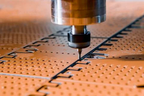 The work of a vertical milling machine. The spindle and the cutter. Clean and Фото