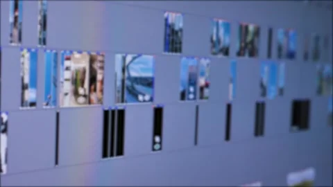 Work in video editing software on a personal computer or laptop is filmed Stock Footage 273842343