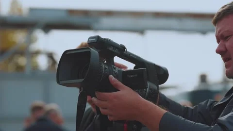 The work of a videographer, a camcorder Stock Footage 252545636