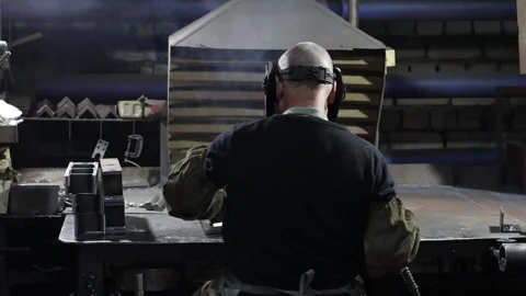 The work of a welder in an enterprise Stock Footage 340518196